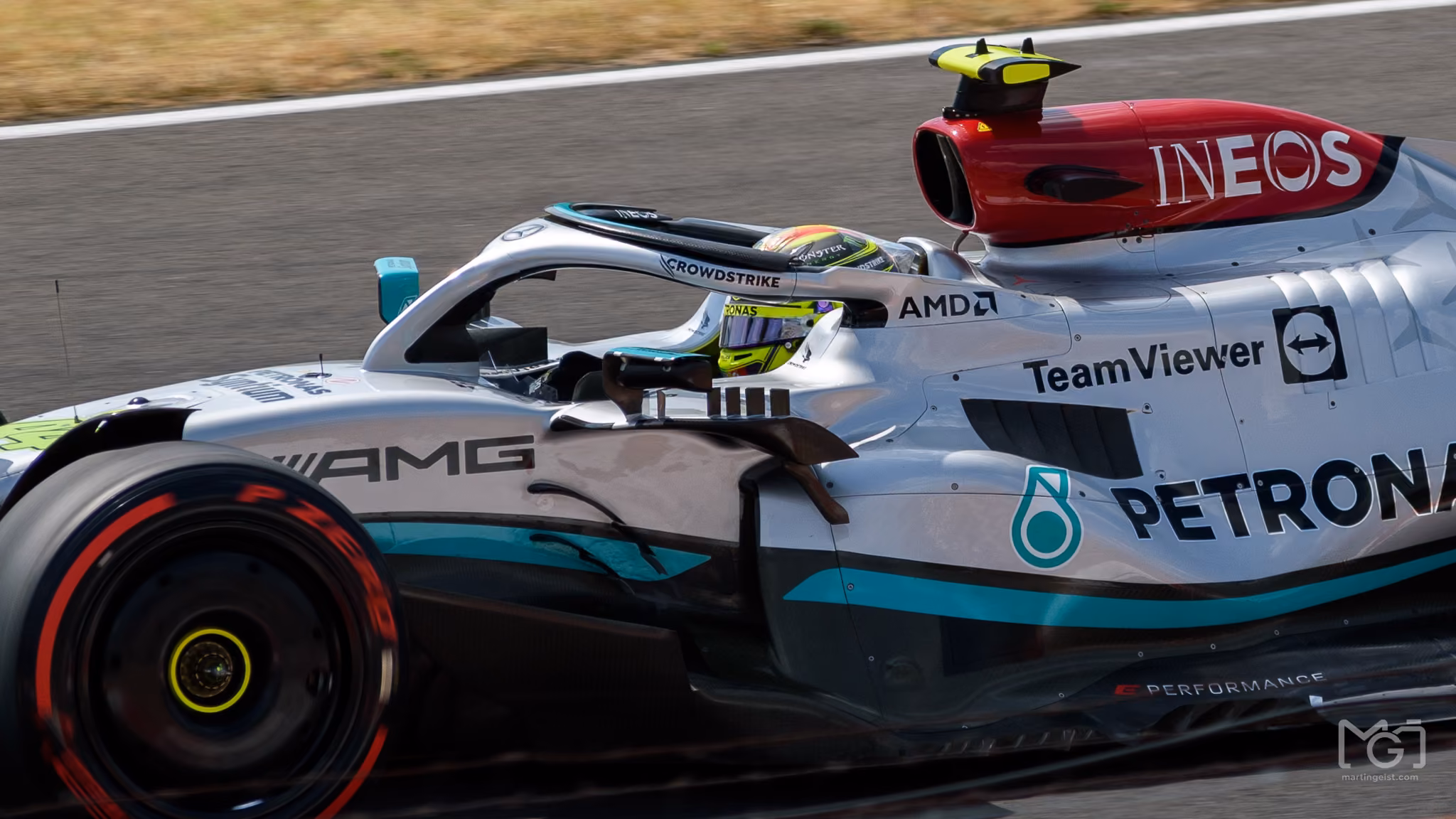 A Formula One car at speed on track
